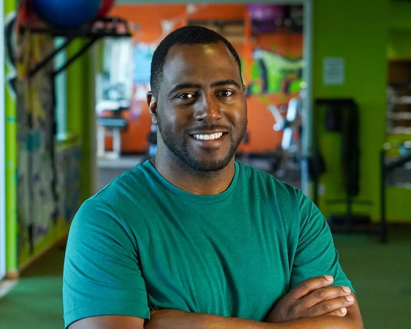 Byron Laws, owner of Hands of Time Wellness, standing arms crossed inside Mission Accomplish Gym in Kennewick, Washington